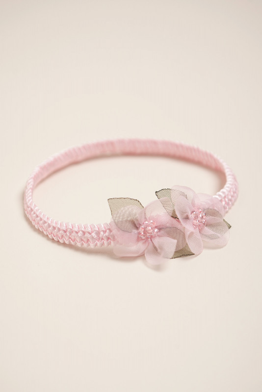vincha elastizada con flor silvestre rosa